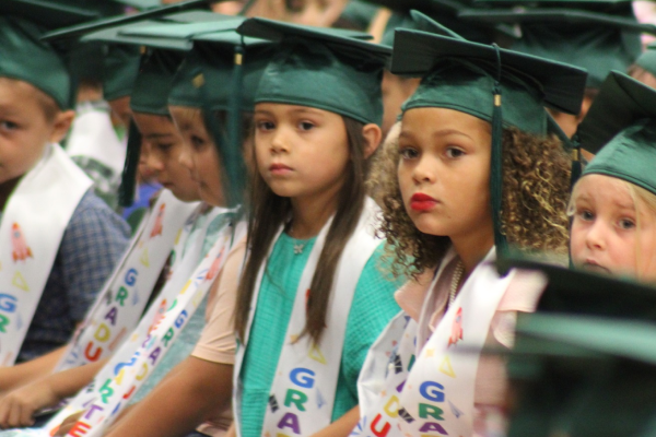 children at graduation